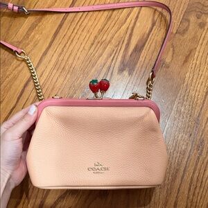 Coach pink strawberry closure